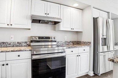 Nestled on the 7th hole of the prestigious Riverfront Golf Club on Riverfront Golf Club in Virginia - for sale on GolfHomes.com, golf home, golf lot