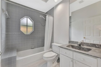 NICE... 3 BEDROOMS 3 FULL BATHROOMS ONE STORY WATERFRONT HOME on Weston Hills Country Club in Florida - for sale on GolfHomes.com, golf home, golf lot
