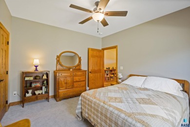 This custom-built 3-bedroom, 2-bath home backs to the 5th hole on The Bridges At Beresford in South Dakota - for sale on GolfHomes.com, golf home, golf lot