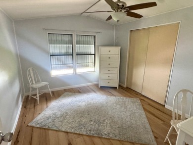 This updated 1985 single-wide mobile home offers just over 800 on Heather Hills Golf Course in Florida - for sale on GolfHomes.com, golf home, golf lot