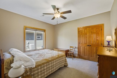 This custom-built 3-bedroom, 2-bath home backs to the 5th hole on The Bridges At Beresford in South Dakota - for sale on GolfHomes.com, golf home, golf lot