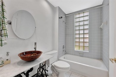NICE... 3 BEDROOMS 3 FULL BATHROOMS ONE STORY WATERFRONT HOME on Weston Hills Country Club in Florida - for sale on GolfHomes.com, golf home, golf lot