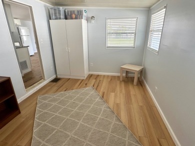 This updated 1985 single-wide mobile home offers just over 800 on Heather Hills Golf Course in Florida - for sale on GolfHomes.com, golf home, golf lot