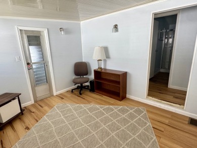 This updated 1985 single-wide mobile home offers just over 800 on Heather Hills Golf Course in Florida - for sale on GolfHomes.com, golf home, golf lot
