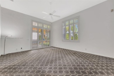NICE... 3 BEDROOMS 3 FULL BATHROOMS ONE STORY WATERFRONT HOME on Weston Hills Country Club in Florida - for sale on GolfHomes.com, golf home, golf lot