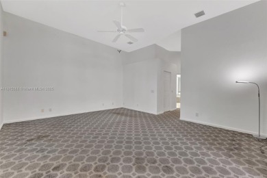NICE... 3 BEDROOMS 3 FULL BATHROOMS ONE STORY WATERFRONT HOME on Weston Hills Country Club in Florida - for sale on GolfHomes.com, golf home, golf lot