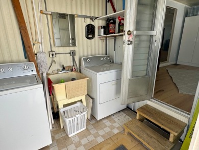 This updated 1985 single-wide mobile home offers just over 800 on Heather Hills Golf Course in Florida - for sale on GolfHomes.com, golf home, golf lot