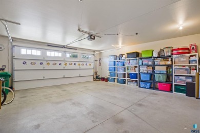 This custom-built 3-bedroom, 2-bath home backs to the 5th hole on The Bridges At Beresford in South Dakota - for sale on GolfHomes.com, golf home, golf lot