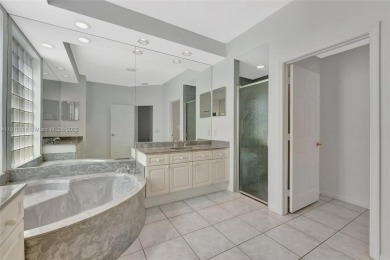 NICE... 3 BEDROOMS 3 FULL BATHROOMS ONE STORY WATERFRONT HOME on Weston Hills Country Club in Florida - for sale on GolfHomes.com, golf home, golf lot