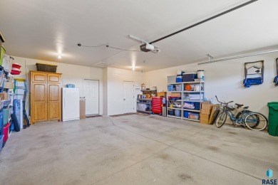 This custom-built 3-bedroom, 2-bath home backs to the 5th hole on The Bridges At Beresford in South Dakota - for sale on GolfHomes.com, golf home, golf lot