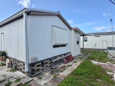 This updated 1985 single-wide mobile home offers just over 800 on Heather Hills Golf Course in Florida - for sale on GolfHomes.com, golf home, golf lot