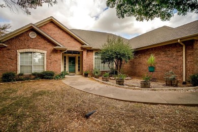 This stunning property in highly desired Pecan Plantation was on Pecan Plantation Country Club in Texas - for sale on GolfHomes.com, golf home, golf lot