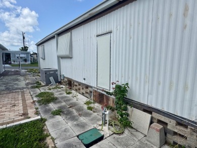 This updated 1985 single-wide mobile home offers just over 800 on Heather Hills Golf Course in Florida - for sale on GolfHomes.com, golf home, golf lot