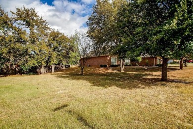 This stunning property in highly desired Pecan Plantation was on Pecan Plantation Country Club in Texas - for sale on GolfHomes.com, golf home, golf lot