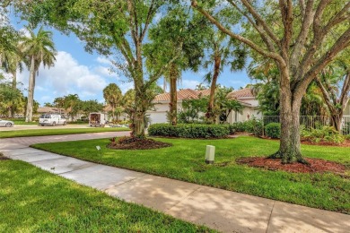 NICE... 3 BEDROOMS 3 FULL BATHROOMS ONE STORY WATERFRONT HOME on Weston Hills Country Club in Florida - for sale on GolfHomes.com, golf home, golf lot