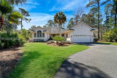 Tucked away in Port Royal, this beautiful single-story home on Port Royal Golf and Racquet Club in South Carolina - for sale on GolfHomes.com, golf home, golf lot