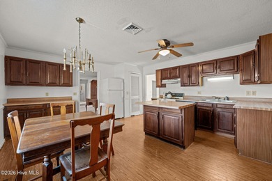 Discover the perfect blend of comfort and utility at 52 on Minnesott Golf and Country Club in North Carolina - for sale on GolfHomes.com, golf home, golf lot