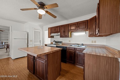 Discover the perfect blend of comfort and utility at 52 on Minnesott Golf and Country Club in North Carolina - for sale on GolfHomes.com, golf home, golf lot