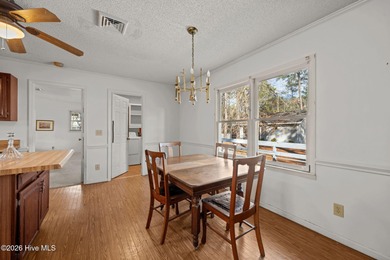 Discover the perfect blend of comfort and utility at 52 on Minnesott Golf and Country Club in North Carolina - for sale on GolfHomes.com, golf home, golf lot