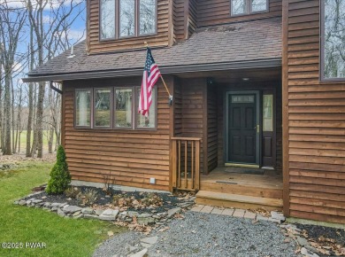 Cedar Chalet on 15th Fairway of Paupack Hills in Tanglwood on Paupack Hills Golf and Country Club in Pennsylvania - for sale on GolfHomes.com, golf home, golf lot