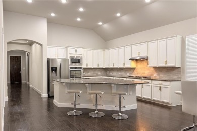 A beautifully designed 3-bedroom, 2-bathroom home by Meritage on The Tribute At the Colony in Texas - for sale on GolfHomes.com, golf home, golf lot