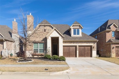 A beautifully designed 3-bedroom, 2-bathroom home by Meritage on The Tribute At the Colony in Texas - for sale on GolfHomes.com, golf home, golf lot