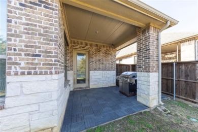 A beautifully designed 3-bedroom, 2-bathroom home by Meritage on The Tribute At the Colony in Texas - for sale on GolfHomes.com, golf home, golf lot