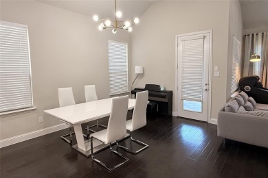 A beautifully designed 3-bedroom, 2-bathroom home by Meritage on The Tribute At the Colony in Texas - for sale on GolfHomes.com, golf home, golf lot