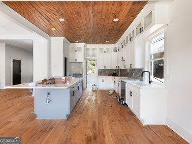 Come tour this beautifully finished new construction home in on Innsbruck Resort and Golf Club in Georgia - for sale on GolfHomes.com, golf home, golf lot