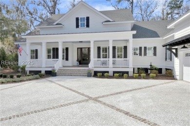 Lowcountry perfection nestled on this large homesite in on Oldfield Golf Club in South Carolina - for sale on GolfHomes.com, golf home, golf lot