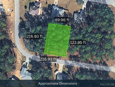 This lot is adjacent to a corner lot at 1263 W Fan Drive on Citrus Springs Country Club in Florida - for sale on GolfHomes.com, golf home, golf lot