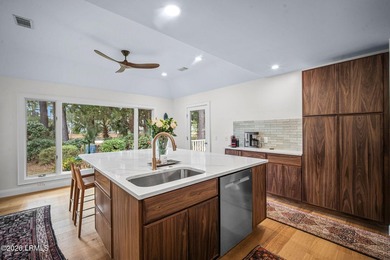 Beautiful golf course and pond views combined with a park-like on Dataw Island Club in South Carolina - for sale on GolfHomes.com, golf home, golf lot