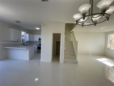 Beautifully remodeled 3BR/2.5BA two-story townhome in the highly on Country Club of Miami in Florida - for sale on GolfHomes.com, golf home, golf lot