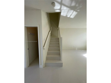 Beautifully remodeled 3BR/2.5BA two-story townhome in the highly on Country Club of Miami in Florida - for sale on GolfHomes.com, golf home, golf lot