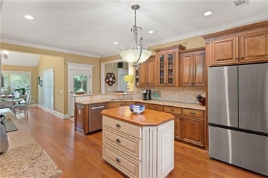 Welcome to 152 Old Wharf Rd--an exceptional single-level home in on Oak Grove Island Golf and Country Club in Georgia - for sale on GolfHomes.com, golf home, golf lot