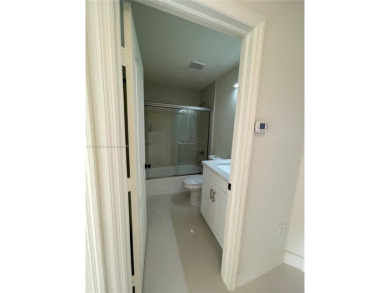 Beautifully remodeled 3BR/2.5BA two-story townhome in the highly on Country Club of Miami in Florida - for sale on GolfHomes.com, golf home, golf lot