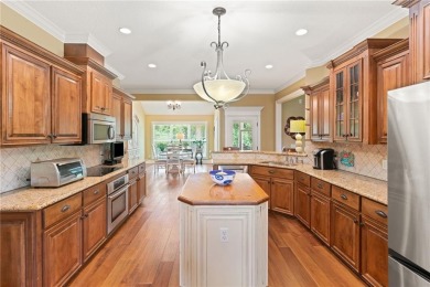 Welcome to 152 Old Wharf Rd--an exceptional single-level home in on Oak Grove Island Golf and Country Club in Georgia - for sale on GolfHomes.com, golf home, golf lot