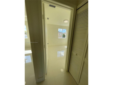 Beautifully remodeled 3BR/2.5BA two-story townhome in the highly on Country Club of Miami in Florida - for sale on GolfHomes.com, golf home, golf lot
