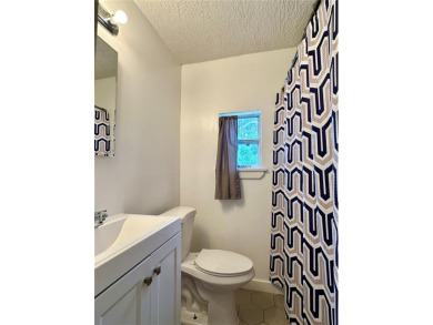 3 bedroom 1 bath on an oversized lot close to everything in on Clearwater Country Club in Florida - for sale on GolfHomes.com, golf home, golf lot