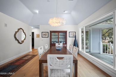 Beautiful golf course and pond views combined with a park-like on Dataw Island Club in South Carolina - for sale on GolfHomes.com, golf home, golf lot