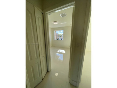 Beautifully remodeled 3BR/2.5BA two-story townhome in the highly on Country Club of Miami in Florida - for sale on GolfHomes.com, golf home, golf lot