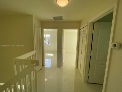 Beautifully remodeled 3BR/2.5BA two-story townhome in the highly on Country Club of Miami in Florida - for sale on GolfHomes.com, golf home, golf lot