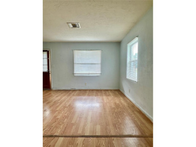 3 bedroom 1 bath on an oversized lot close to everything in on Clearwater Country Club in Florida - for sale on GolfHomes.com, golf home, golf lot