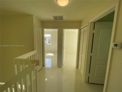 Beautifully remodeled 3BR/2.5BA two-story townhome in the highly on Country Club of Miami in Florida - for sale on GolfHomes.com, golf home, golf lot