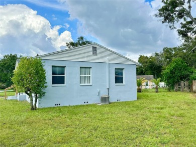 3 bedroom 1 bath on an oversized lot close to everything in on Clearwater Country Club in Florida - for sale on GolfHomes.com, golf home, golf lot