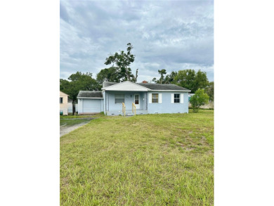 3 bedroom 1 bath on an oversized lot close to everything in on Clearwater Country Club in Florida - for sale on GolfHomes.com, golf home, golf lot