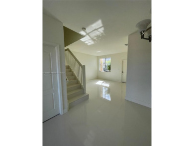 Beautifully remodeled 3BR/2.5BA two-story townhome in the highly on Country Club of Miami in Florida - for sale on GolfHomes.com, golf home, golf lot