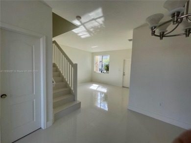 Beautifully remodeled 3BR/2.5BA two-story townhome in the highly on Country Club of Miami in Florida - for sale on GolfHomes.com, golf home, golf lot