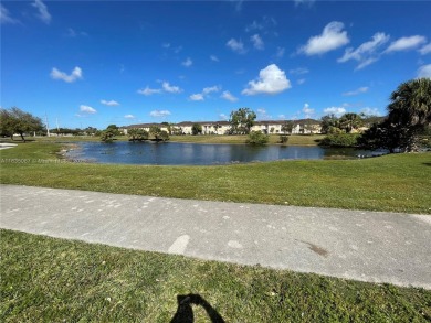 Beautifully remodeled 3BR/2.5BA two-story townhome in the highly on Country Club of Miami in Florida - for sale on GolfHomes.com, golf home, golf lot