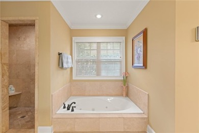 Welcome to 152 Old Wharf Rd--an exceptional single-level home in on Oak Grove Island Golf and Country Club in Georgia - for sale on GolfHomes.com, golf home, golf lot